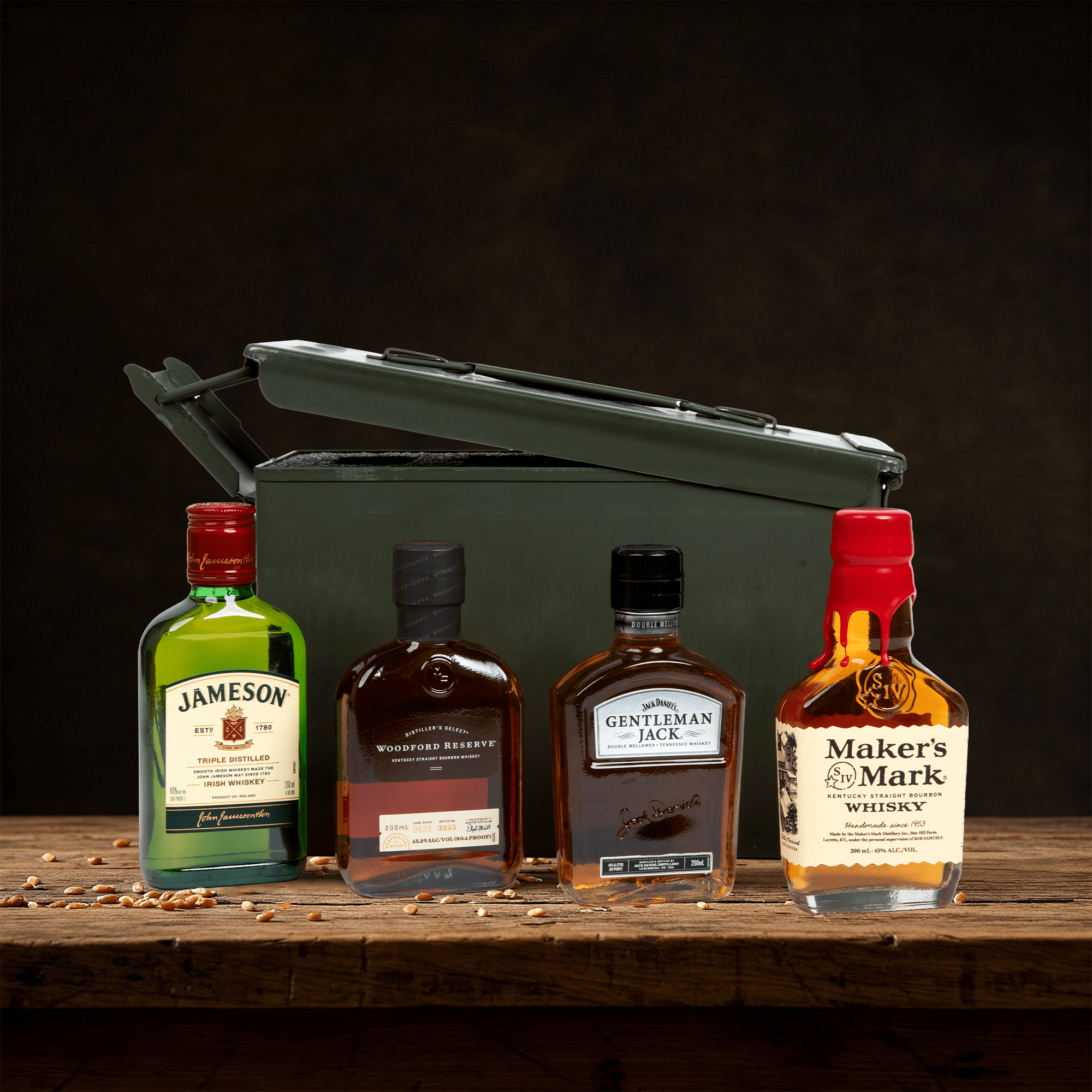 Closed ammo can filled with four bottles of whiskey – rugged whiskey gift set for men